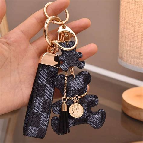 louis vuitton keychain black|louis vuitton bear keychain.